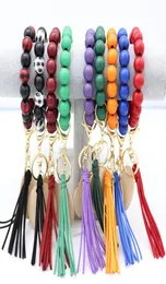 Whole foreign trade beaded wooden bead keychain fashion personality disc tassel bracelet key ring multicolor optional9008824