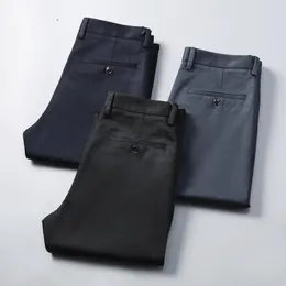 Męskie spodnie T6629 Autumn Winter Style Jakość czystego koloru Slim Fit Schodźnie