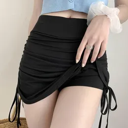 Spódnice czarne seksowne mini kobiety 2023 Letnia strona sznurka elastyczna kobieta elegancka spódnica o wysokiej talii