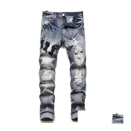 Mens Jeans European Jean Hombre Letter Star Men broderi lapptäcke rippade för tren motorcykelbyxa mager kläder droppleverans app dhvjw