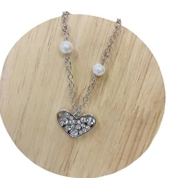 Halsband miumius designer lyx mode pärla hjärtkrage kedja halsband prydnad mångsidig enkel och avancerad kristall hjärtform geometriska kvinnors hänge