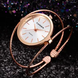 Armbanduhren CANSNOW Kreative Armband Frauen Uhren Elegante Schlanke Edelstahl Armreif Quarzuhr Mode Einfache Damen