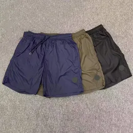 Designer-Herren-Shorts, klassische Badge-Logo-Shorts, Herren-Strandhose, leichte und dünne, schnell trocknende Hose, 3/4-Sport-Shorts, lockere, lässige Outdoor-Laufshorts