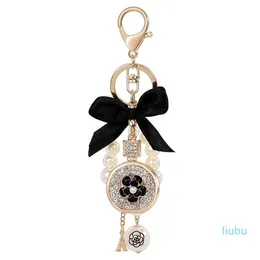 Lovely cute bow pearl flower perfume bottle keychains new fashion ins luxury designer diamond rhinestone bag charm283P