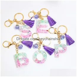 حلقات المفاتيح Colorf English Letter keychains with tassel requin filling ball a-z inial chain handbag pendant cut
