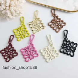 Unique design geometric hollowing keychain delicate multi-color bag charm pendant