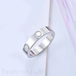 Män ring lyxiga smycken designer ring diamant kärlek guld silver pläterad engagemang rostfritt stål non fade accessoarer multicolour skruvringar för kvinna zb010