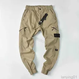 Wysokiej jakości plastry odznaki męskie listy mody Stone spodni Projektant Projektant Jogger Pants Cargo Fly Fly Sports Spodni 4Homme Clothing Island 44HCV
