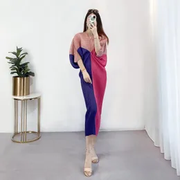 Vestidos casuales Miyake plisado linterna de mujer vestido de manga de murciélago 2023 estilo primavera / verano elegante empalmado con cuello en v moda larga