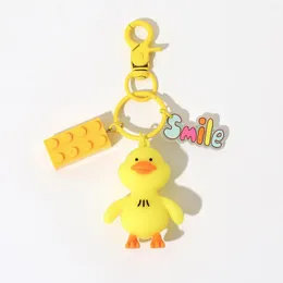 Charm Bracelets dcarzz 귀여운 오리 키 체인 보석 만화 Kawaii 패키지 펜던트 장식 여성 키 링 백 자동차 키.