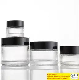 Oddzielne szklane słoiki w wosku butelka kosmetyków kremu wyjdź woski pojemniki