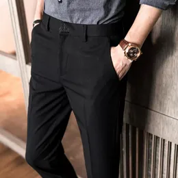 Męskie spodnie Slim Casual Duża moda dla mężczyzn stałych kolorów dziewięciominutowe spodnie 2023 marka jesień/zima zachodnie spodnie