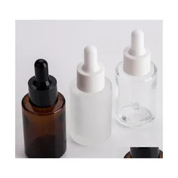 Storage Bottles Jars 100Pcs 30Ml Flat Shoder Frosted Clear Glass Dropper Bottle With White Lid 1Oz Amber Serum Gold Cap Drop Deliv Dhepv