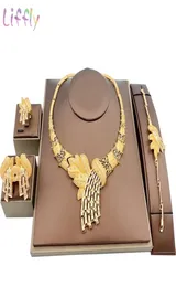Nigeriaanse mode -sieraden sets bladvorm ketting goud armband dames dubai sieraden set oorbellen bruids kristallen ring 201229574011