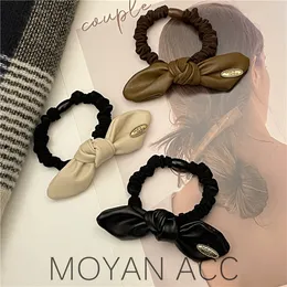 Mode pu bowknot band scrunchies h￤stsvansh￥llare elastiska h￥rband kvinnor flickor h￥r banden rep huvudkl￤der chic tillbeh￶r 1298