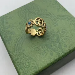 Tasarımcı yüzük altın çiçek desen aşk lüks yüzük mavi elmas moda kadın takı erkekler parlayan g harf kutu ile