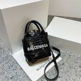 Bolsas de bolsas baratas 80% de desconto em um padrão de pedra de carga de moda mensageiro de grande capacidade