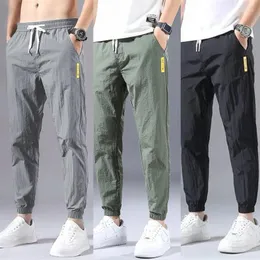 Pantaloni da uomo Fitness Casual Sport Moda PANTALONI UOMO JEAN Hip Hop Abbigliamento Collant Jogging da uomo A quadri Palestra Streetwear Overol Hombre