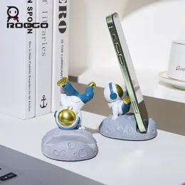Dekorativa föremål Figurer Roogo Hip Hop Astronaut Sculpture Small Creative Space Phone Holder For Desk Resin Miniature Home Decor 230111