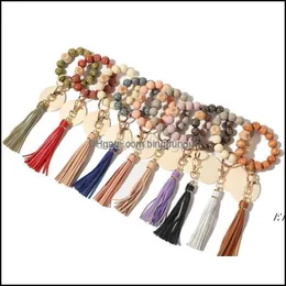 Party Favor New Gift Wooden Beads Bracelets High Quality Leather Lepoard Tassel Wristbands Bracelet Bag Pendant Decor Rra12481 Drop Otgty
