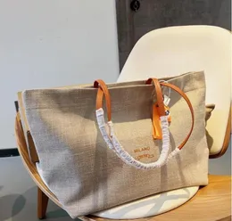 2023 Designer de luxo Totes Bags Mulheres Sacos de compras de grande capacidade Letra da moda Impressão de letra de ombro clássica com pequeno pingente quatro cores