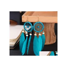 Student Bohemian moda biżuteria vintage Dreamcatcher kolczyki drewniane koraliki ręcznie robione z piórem Dangle Dangle dostawa dh0mk