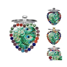 Keychains Lanyards 민족 녹색 Boho Peacock Feather Glass Art Heart Heart Hearchain 수제 보석 최고급 금속 키 링 홀더 4 C DHK1A