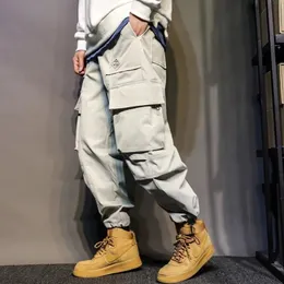 Męskie spodnie Casual Men Tooling Narzędzia boczne spodnie do kieszeni 2023 Japoński trend belka stóp dziewięć punktów ładunek przystojny plus Sizemen's