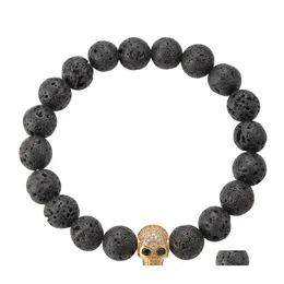 Bärade strängar toppkvalitet lava rock pärlkedja armband svart naturlig energisten med guld skelskelett charm armband för kvinnor otmug