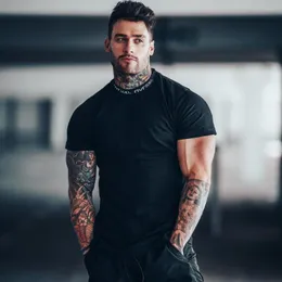 Camas de camisetas masculinas camisa de fitness de ginástica masculino de algodão casual T-shirt masculino Treinamento de musculina Treinamento de tee skinny Tops