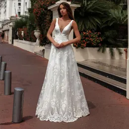 Bröllopsklänning strand sexig v-hals spetsklänningar 2023 ärmlös blommig applikation tyll brud klänningar en linje golvlängd vestido de novia