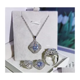 Conjuntos de jóias de casamento Conjunto de luxo Sparkling Live 925 Sterling Sier Round Cut Moissanite CZ Diamond Gemtones Ring Colar Stud Earrin Dhrhi