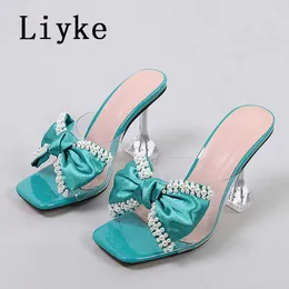 PVC 여성을위한 투명한 슬리퍼 2023 패션 진주 나비-매듭 여름 샌들 맑은 하이힐의 큰 크기 46 신발 레이디 0129