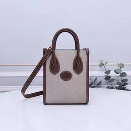 Lyx tygväska Totes designer axelväskor för kvinnor Retro mini handväska handväska mode messenger handväskor dam Klassiskt mönster Crossbody-väska i läder dicky0750