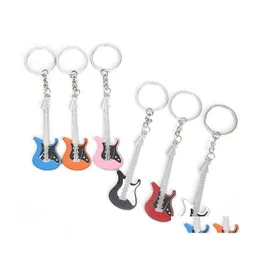 Nyckelringar Fashion Jewellery Accessories Guitar Ring Musical Instruments Keys sp￤nne Originalitet Pendant Ornament Keychains Metal Me DHQD0