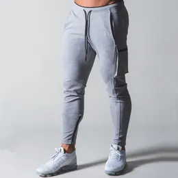 Pantaloni da uomo Cotone Casual Skinny Uomo Pantaloni sportivi Pantaloni autunno Pantaloni solidi Pantaloni sportivi da uomo Palestra Fitness Allenamento Bodybuilding Bottoms 230131