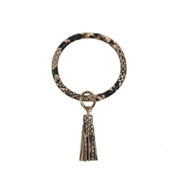 Nyckelringar Lanyards Creative Pu Leather Armband Keychain Round Piece Drop Oil Tassel Pendant 301 Q2 Leverans Fashion Accessories Dhunj