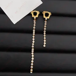 Brass beauty portrait inlaid zircon left and right side length asymmetrical tassel earrings for ladies Dangle Chandelier, banquets, parties, weddings