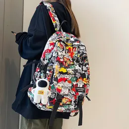 Torby szkolne harajuku dziewczynka męska torba żeńska graffiti druk mężczyźni plecak Książka Boy Nylon Ladies Fashion Laptop Student 230801