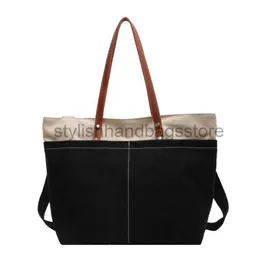 Totes Fashion Edition Canvas axel stor kapacitet handväska rese pendlare lättvikt kvinnors fritid horisontell kropp bagstylishhandbagsstore