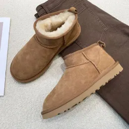 2022 Botas de inverno pele plataforma senhoras botas de neve pele de carneiro real lã corte baixo sapatos de pele quente homem e mulher botas curtas de inverno super mini masculino feminino baixo UGGity