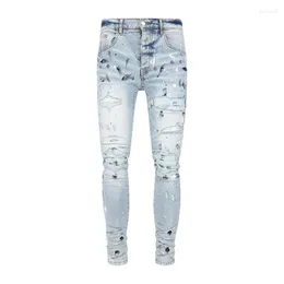 Mäns jeans 2023 Streetwear Speckle Paint Dot Patch Ink målade rippade mode ljusblå hål mager stretch denim byxor