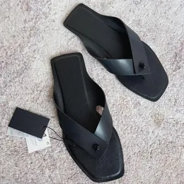 Talltor maxdutti 2023 Franska kontor damer fashionabla skor kvinnors eleganta fårläder casual flip flops för sommaren