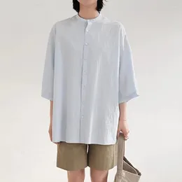 Kvinnors läder en fast färgad kinesisk bomull blandad lös bakmassa kort hylsa lång skjorta avslappnad struktur allt