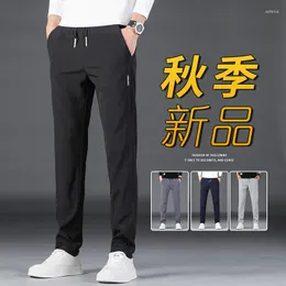 メンズパンツ2023カジュアルな男性が韓国語バージョンの大規模ファッショントレンドライトビジネスストレートスウェットパンツ