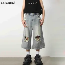 Mäns jeans Luzhen Summer Trendy Straight Loose Warnout Broken Hole Design Men's Croped Trousers High Street Wear Shorts Pants 3DB1D0 230804