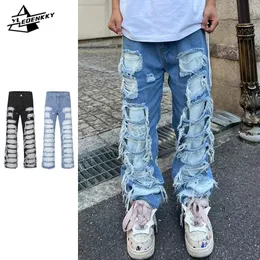 Męskie dżinsy uszkodzone dżinsy mężczyźni kobiety hip-hop retro dziury dżinsowe spodnie w trudnej sytuacji Patchwork Design Kowboja Spodnie Harajuku swobodne worki 230804