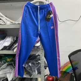 Mensbyxor blå nålar Sweatpants Män kvinnor Kvalitet rosa stripe fjärilspår smala awge byxor 230809