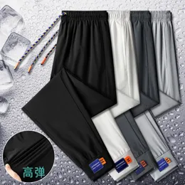 メンズパンツ6xl夏のクイック乾燥弾性ウエストジョガーカジュアルズボンゆるいレギンスタイドシンスタイルファッション