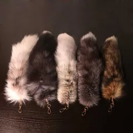 سلاسل المفاتيح Lanyards New Fashion Wolf Fox Tail Fur Chiefsains للجنسين Pompom Prendant Car Keyring حامل السلاسل الرئيسية اللطيفة سحر أكياس إكسسوارات